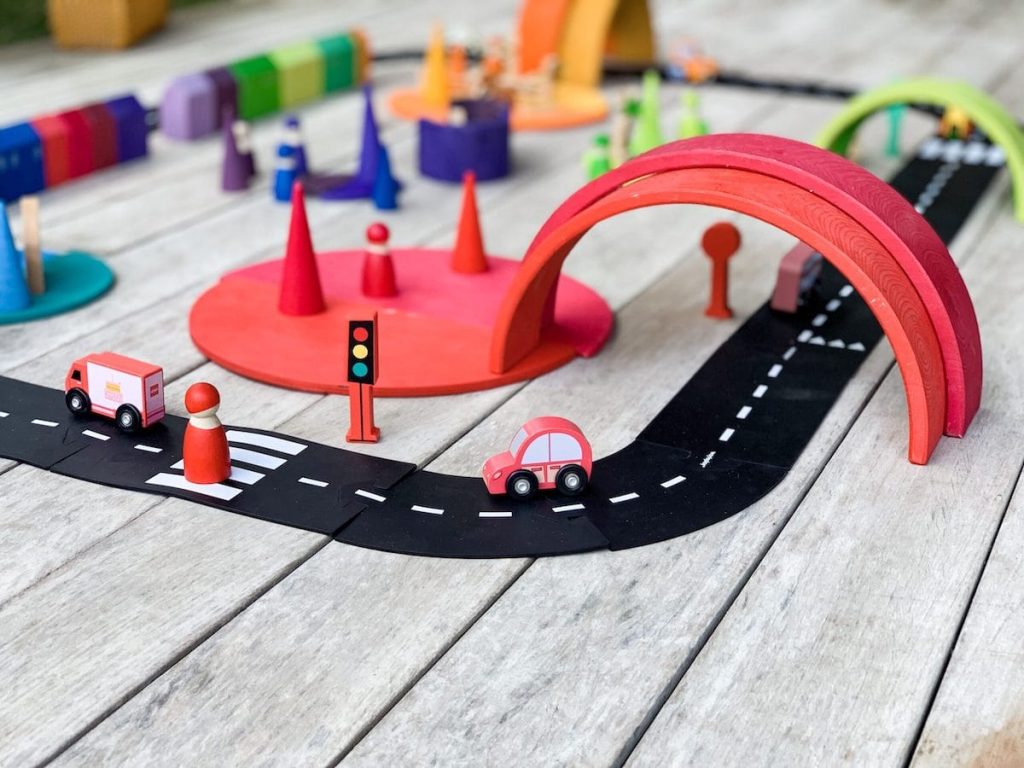 grimms-toys-small-world-with-friend-and-rainbow-bridge-min-scaled | the fairy glitch mother grimms toys - city red curve